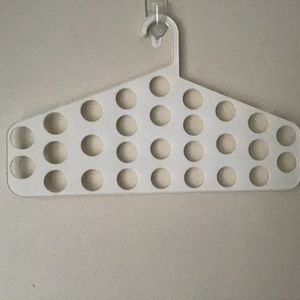 Closet hanger accessories holder